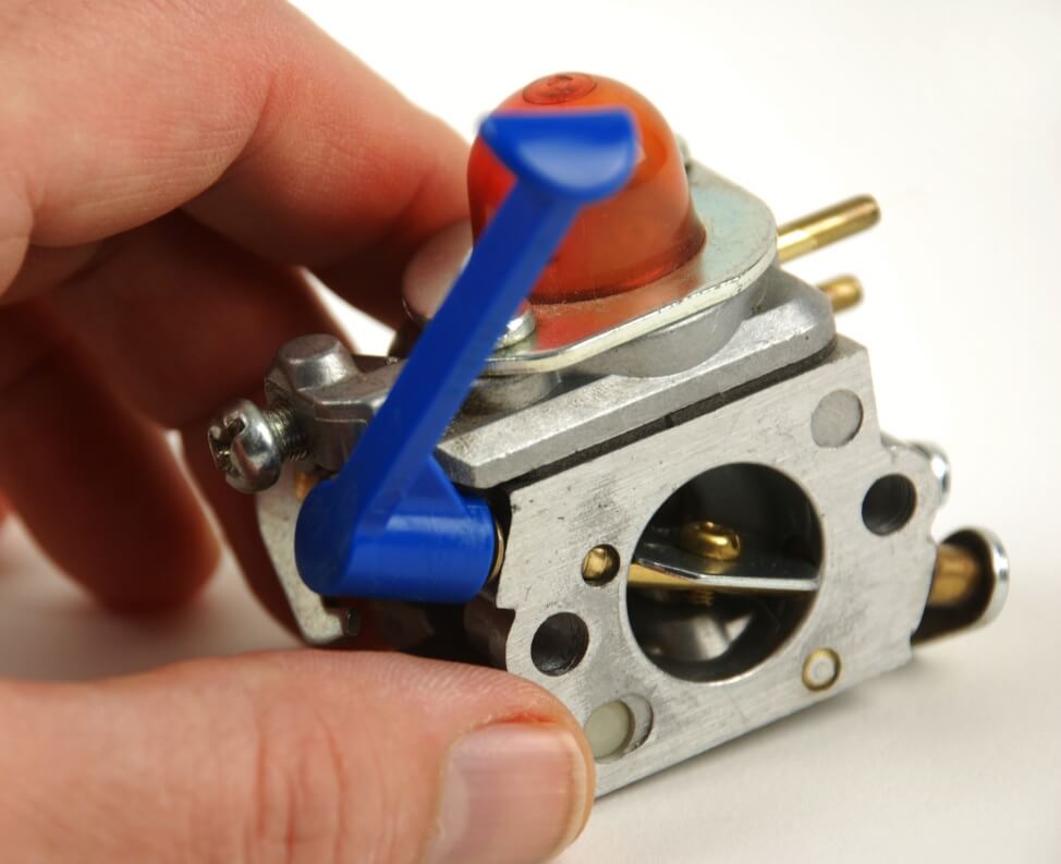Segway Navimow carburetor close-up with blue lever