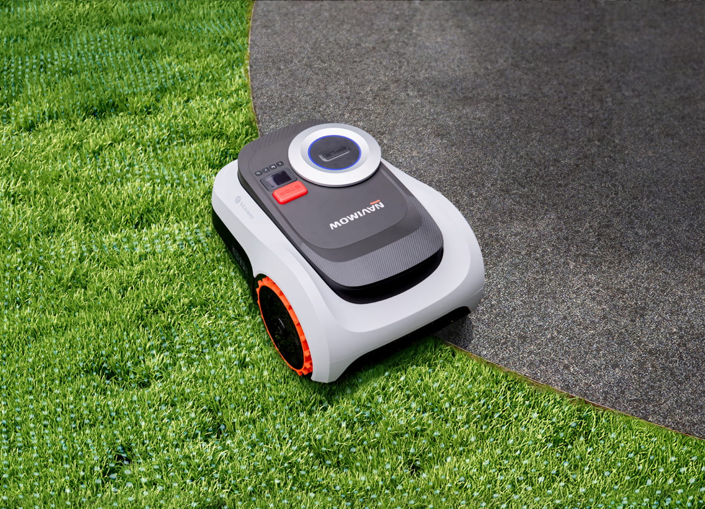Segway Navimow i2 LiDAR robot lawn mower sits on green grass.