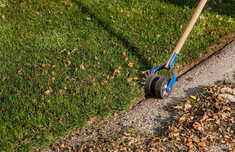 Segway Navimow edging tool trimming lawn edge by sidewalk
