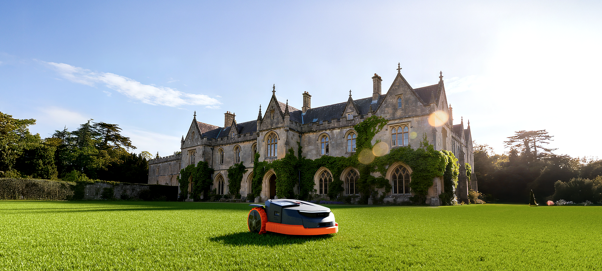 Navimow i110E robot lawn mower mows the large estate garden.