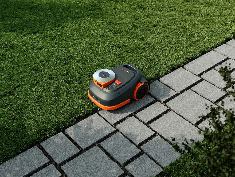 Navimow H2 robot lawn mower is on a lawn.