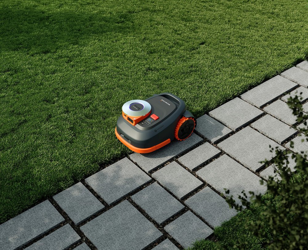 Navimow H2 robot lawn mower is on a lawn.