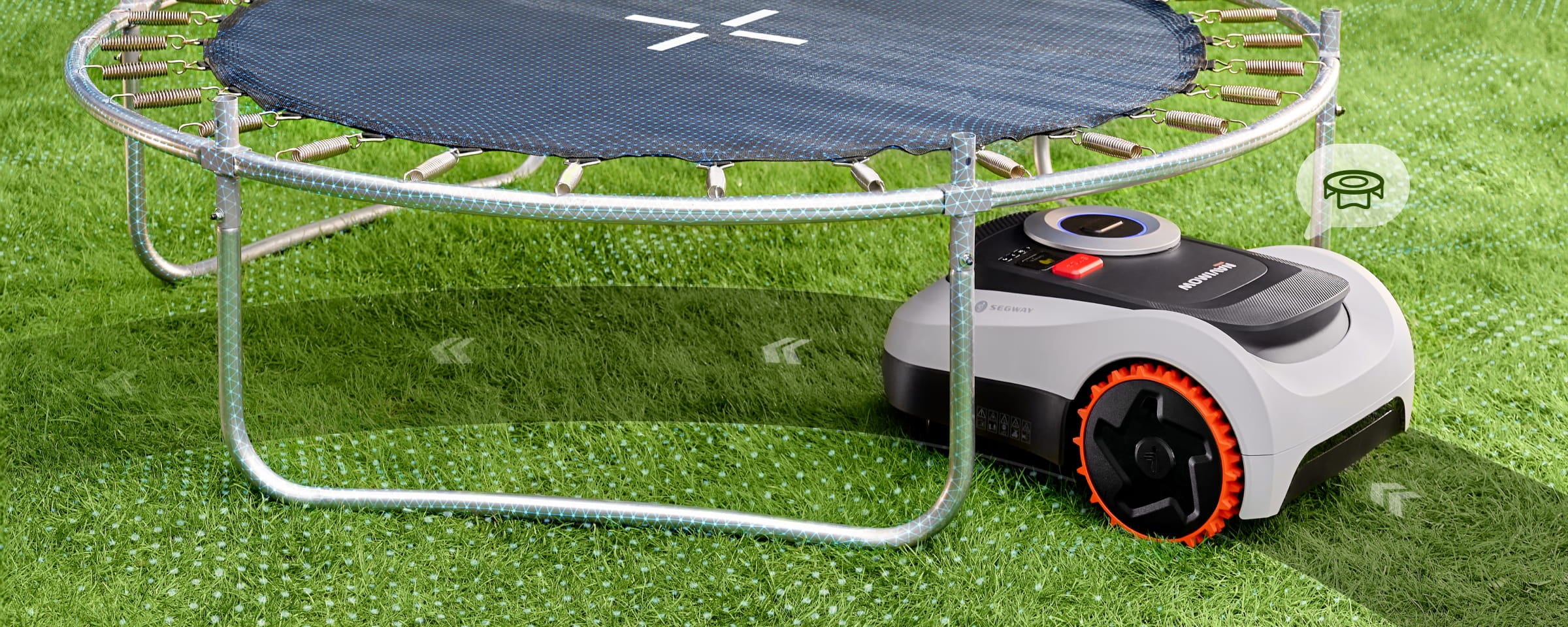 Segway Navimow i2 LiDAR robot lawn mower mows grass under trampoline.