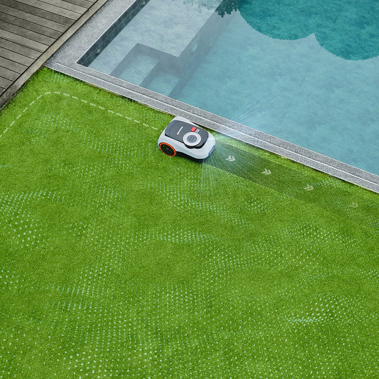Navimow i2 LiDAR robot lawn mower mows grass beside the pool.